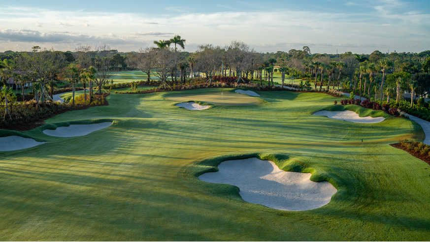Golf green surrounded by sand bunkers